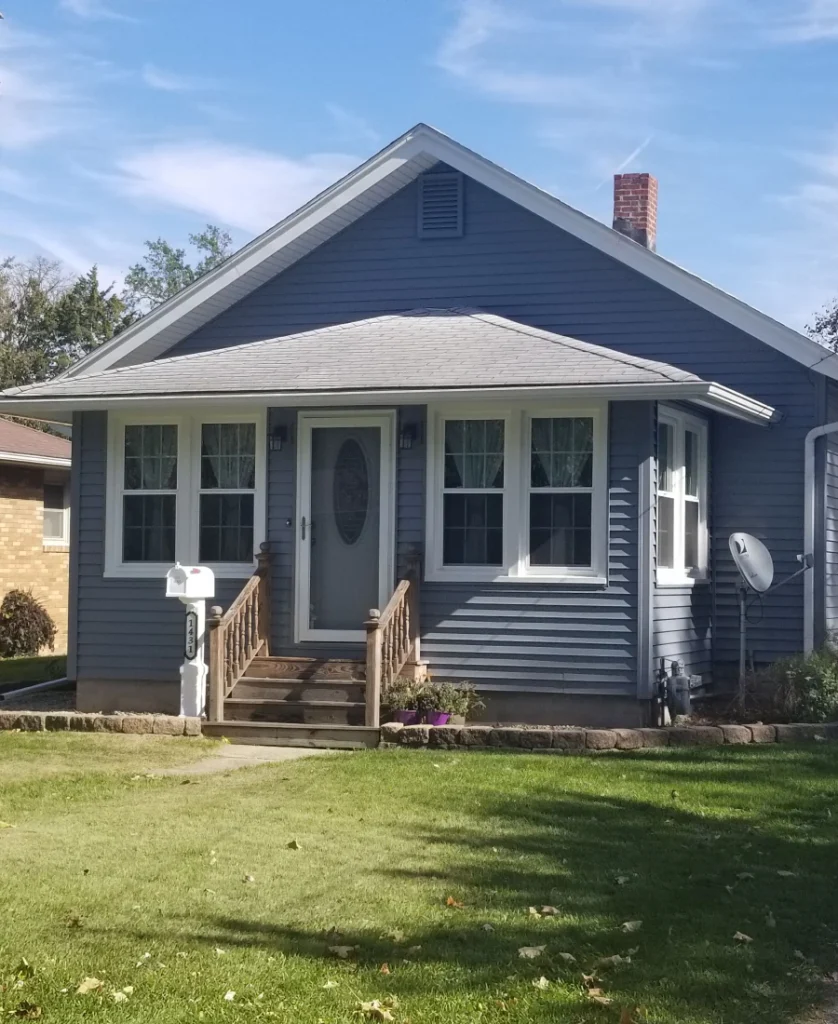 A central-Illinois home with new roof, siding, and windows by Voorhees