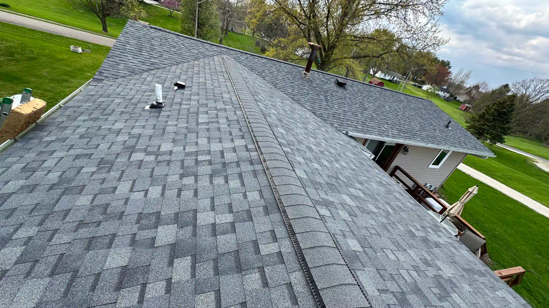 A new asphalt-shingle roof installed by Voorhees after storm damage
